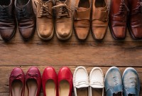 shoes with men and women various styles on a wooden floor - lifestyles.